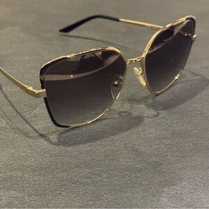 Prada Gold Frame Sunglasses with Black Lenses